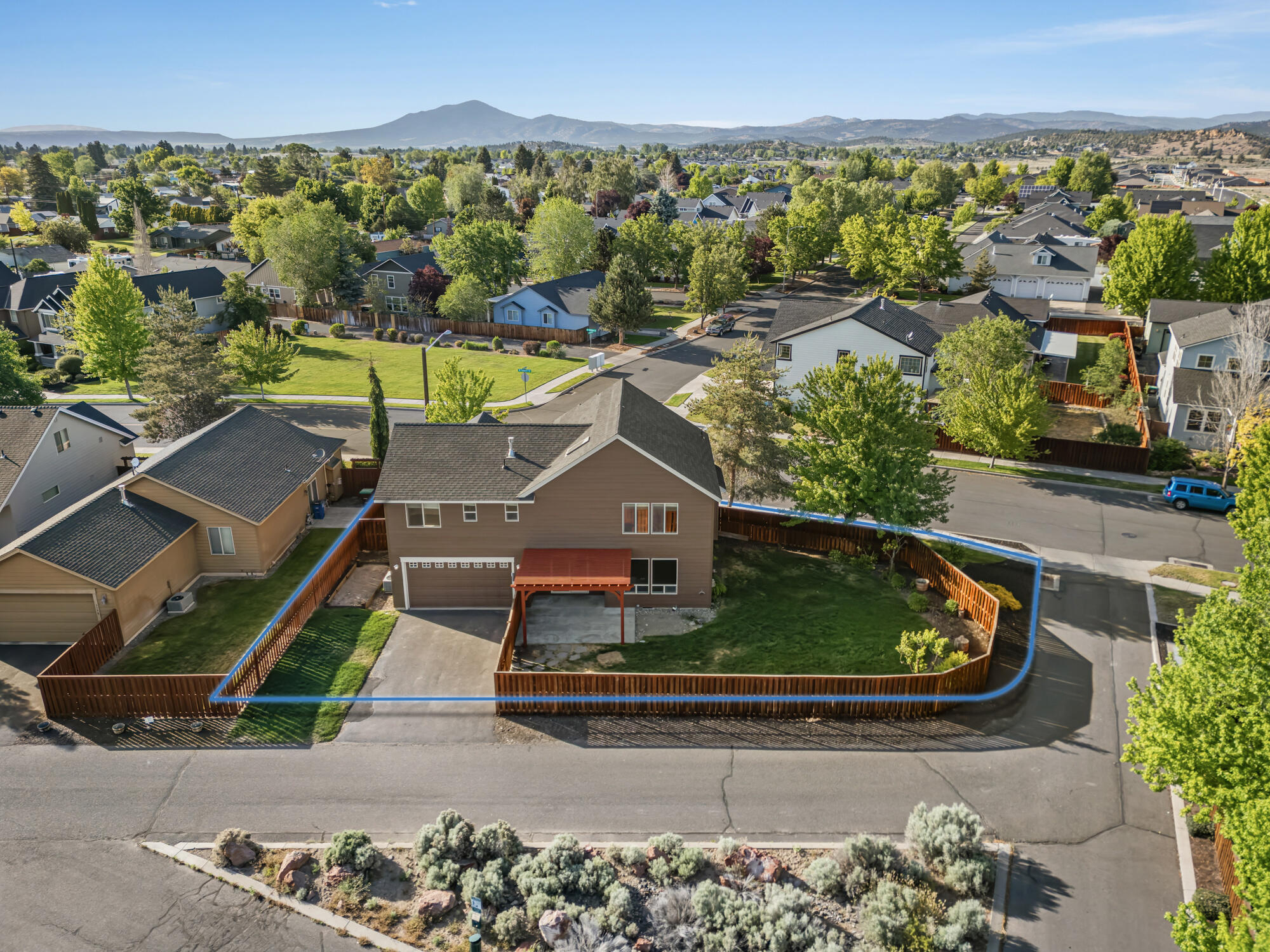 1402 Northeast Hudspeth Road Prineville, OR 97754 - Photo 30 of 36 an aerial view of a house with a yard and lake view