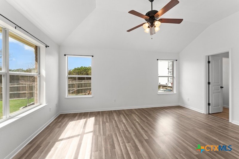 456 County Road 4711 Kempner, TX 76539 - Photo 15 of 31 a view of an empty room with a window and wooden floor