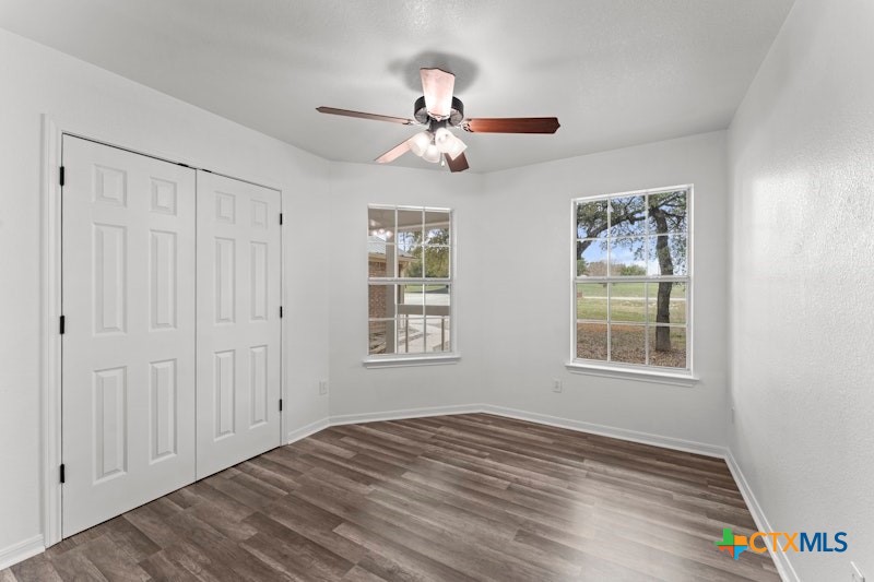 456 County Road 4711 Kempner, TX 76539 - Photo 19 of 31 wooden floor in an empty room with a window