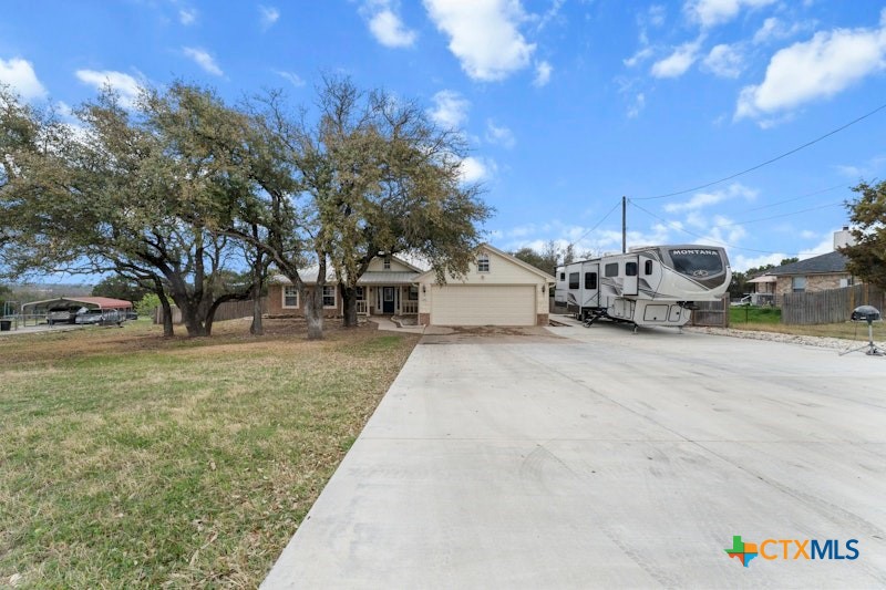 456 County Road 4711 Kempner, TX 76539 - Photo 2 of 31 a view of street with parked cars