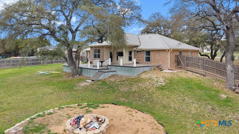 456 County Road 4711 Kempner, TX 76539 - Photo 25 of 31 a front view of a house with garden