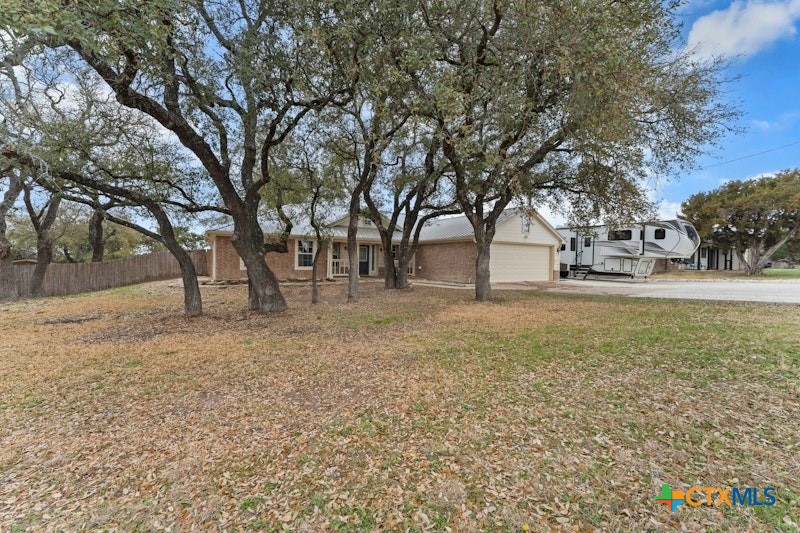 456 County Road 4711 Kempner, TX 76539 - Photo 4 of 31 a view of road with trees