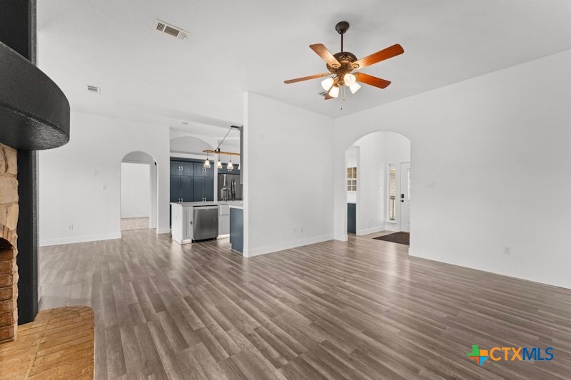 456 County Road 4711 Kempner, TX 76539 - Photo 8 of 31 a view of empty room with wooden floor and ceiling fan