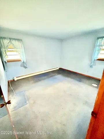 a view of a room with a window