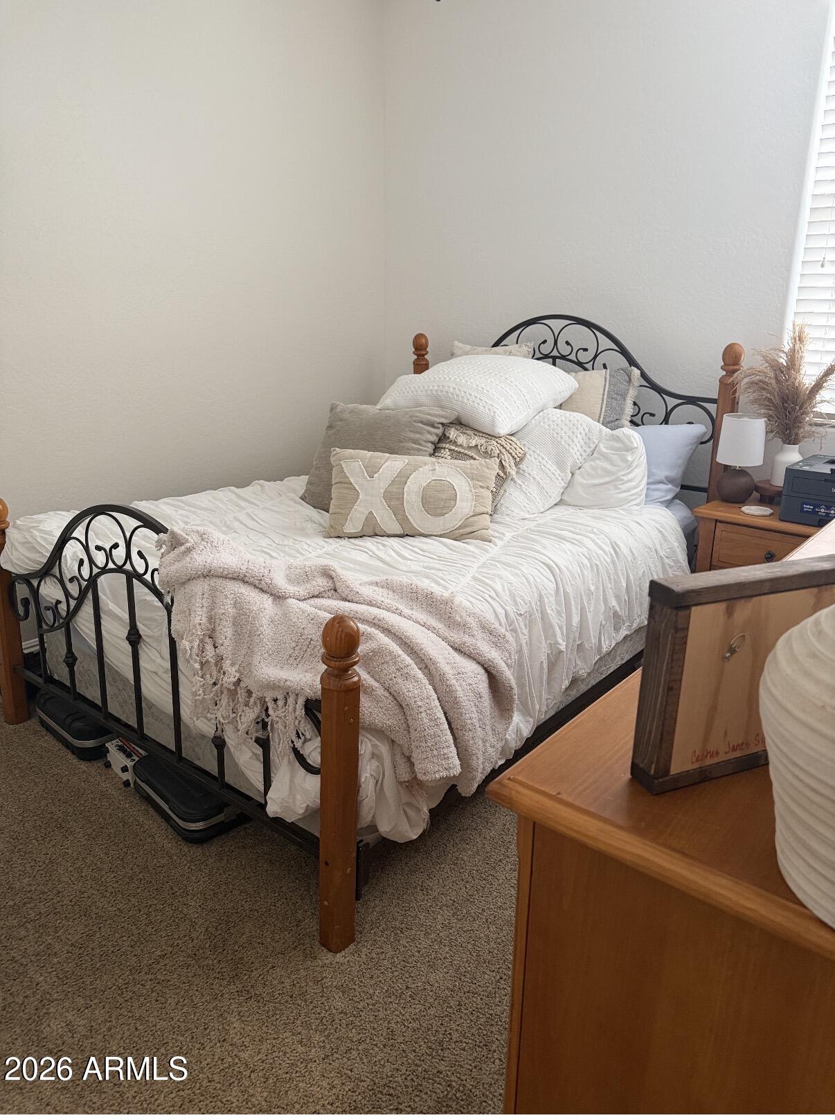 1377 South Chaparral Boulevard Gilbert, AZ 85296 - Photo 14 of 22 a bedroom with a bed and dresser