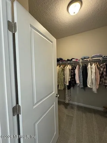 a view of a walk in closet