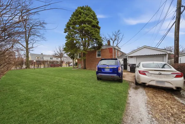 a house view with a garden space
