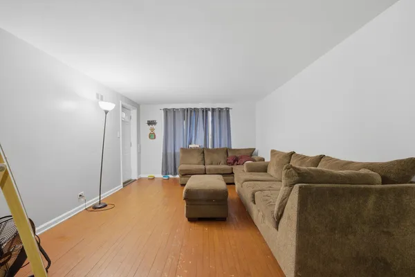 a living room with furniture and a couch