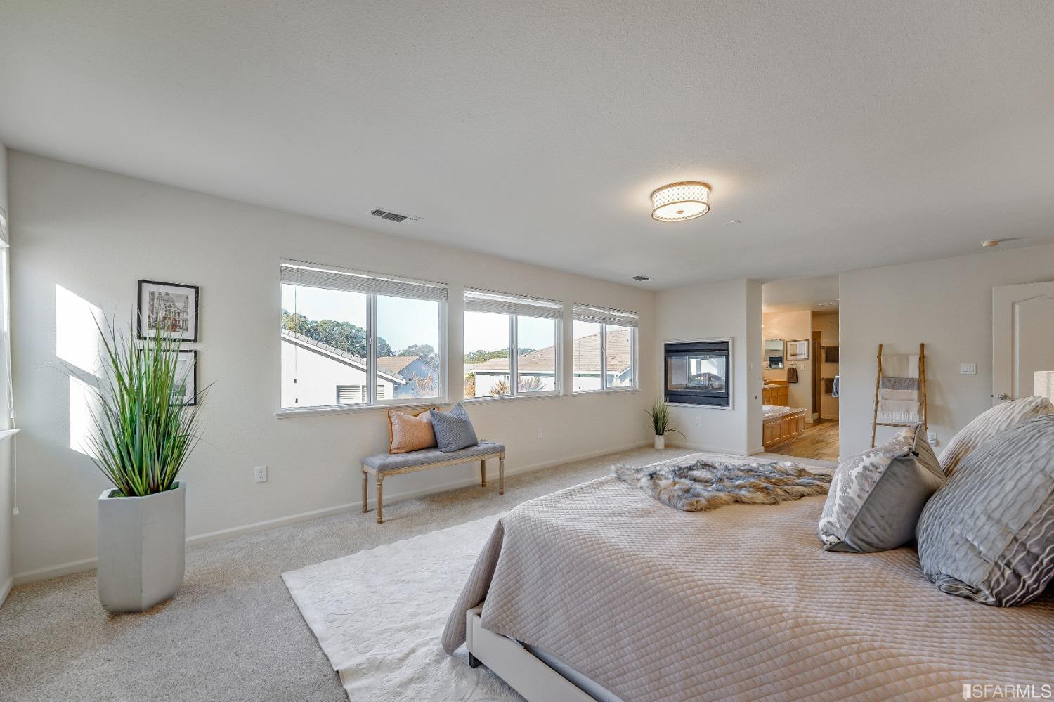 307 Hawk Ridge Drive Richmond, CA 94806 - Photo 11 of 24 a bedroom with a bed and a couch