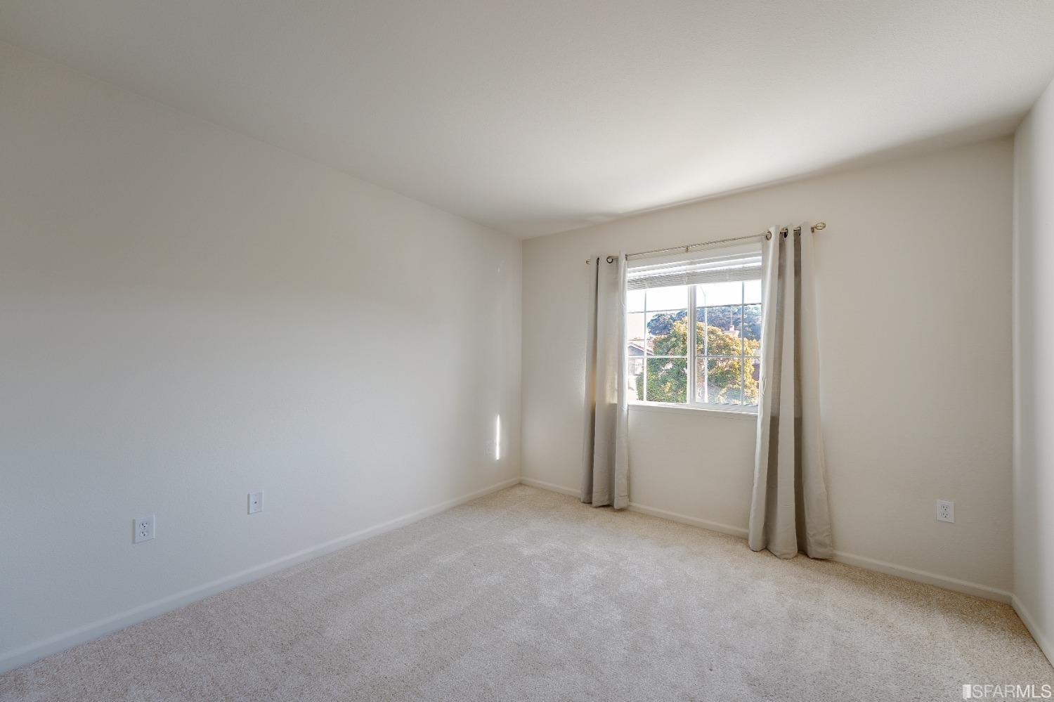 307 Hawk Ridge Drive Richmond, CA 94806 - Photo 14 of 24 an empty room with a window