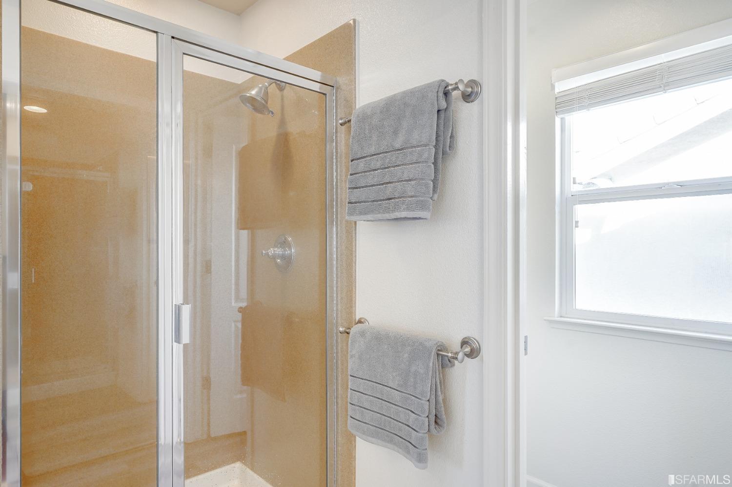 307 Hawk Ridge Drive Richmond, CA 94806 - Photo 16 of 24 a bathroom with a shower and a tub