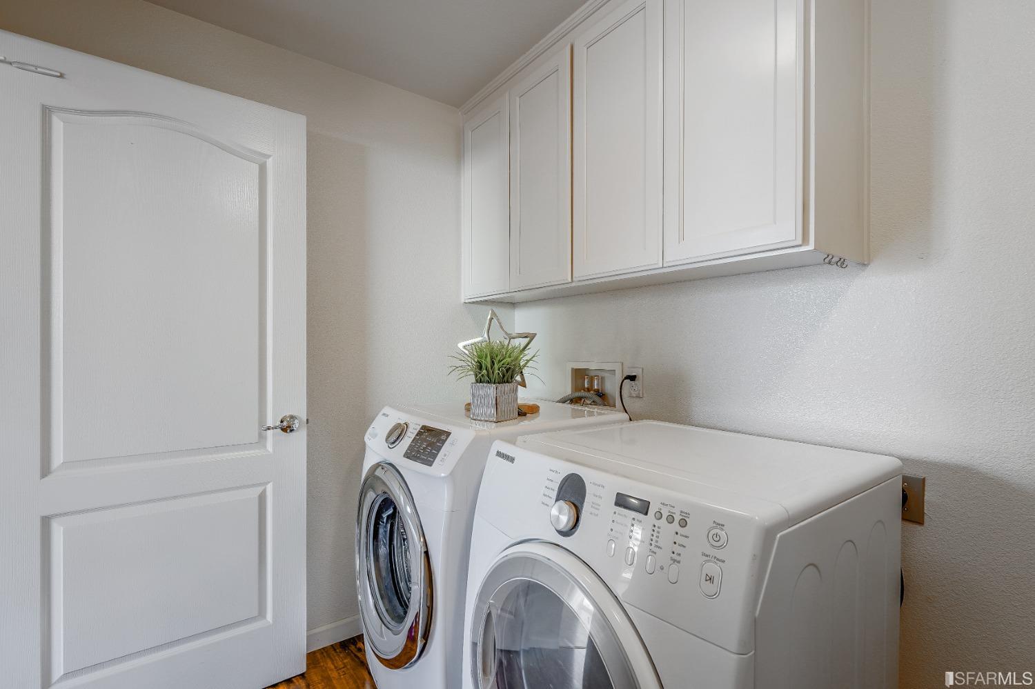 307 Hawk Ridge Drive Richmond, CA 94806 - Photo 18 of 24 a utility room with dryer and washer