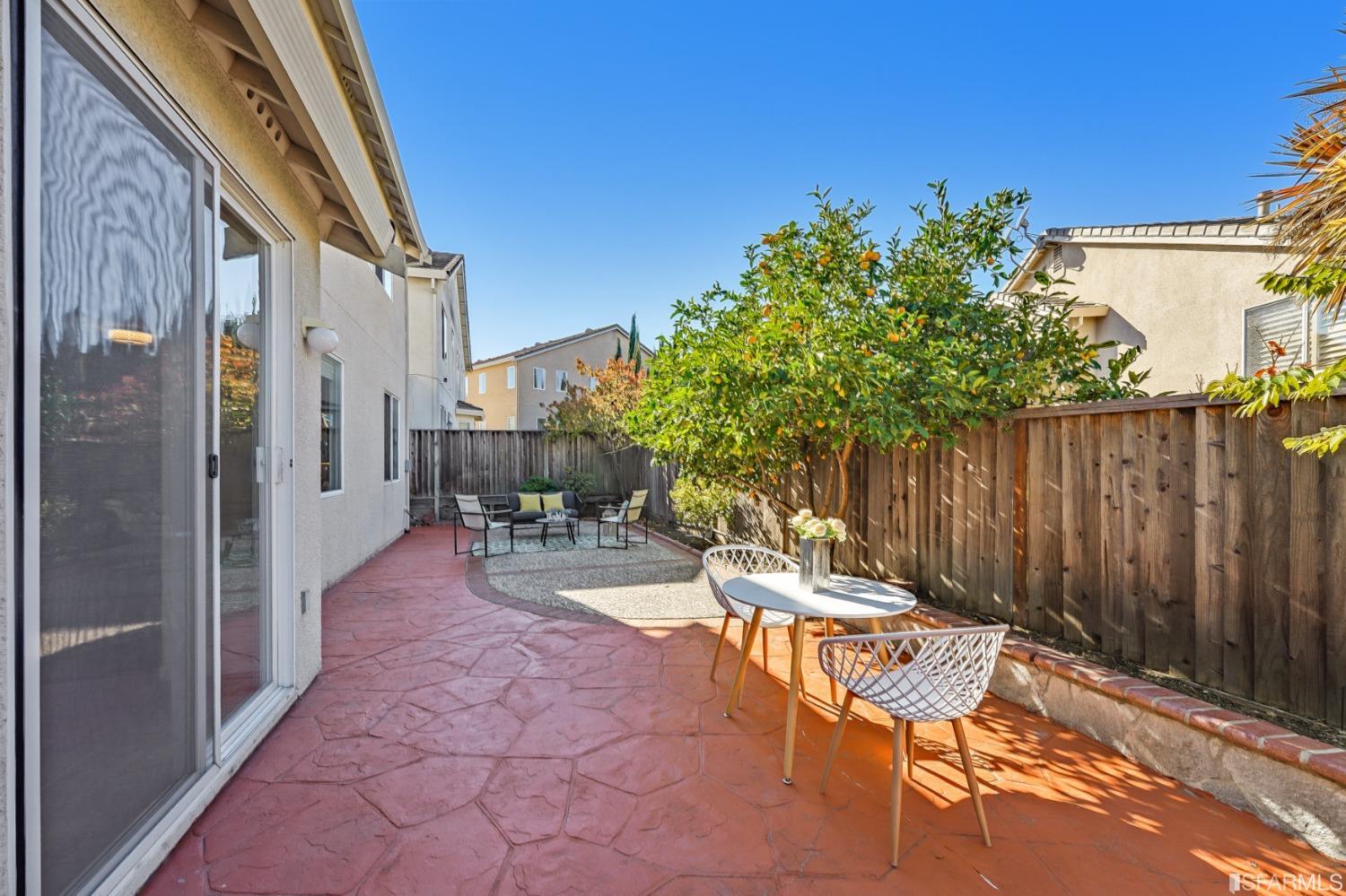 307 Hawk Ridge Drive Richmond, CA 94806 - Photo 19 of 24 a backyard of a house with table and chairs