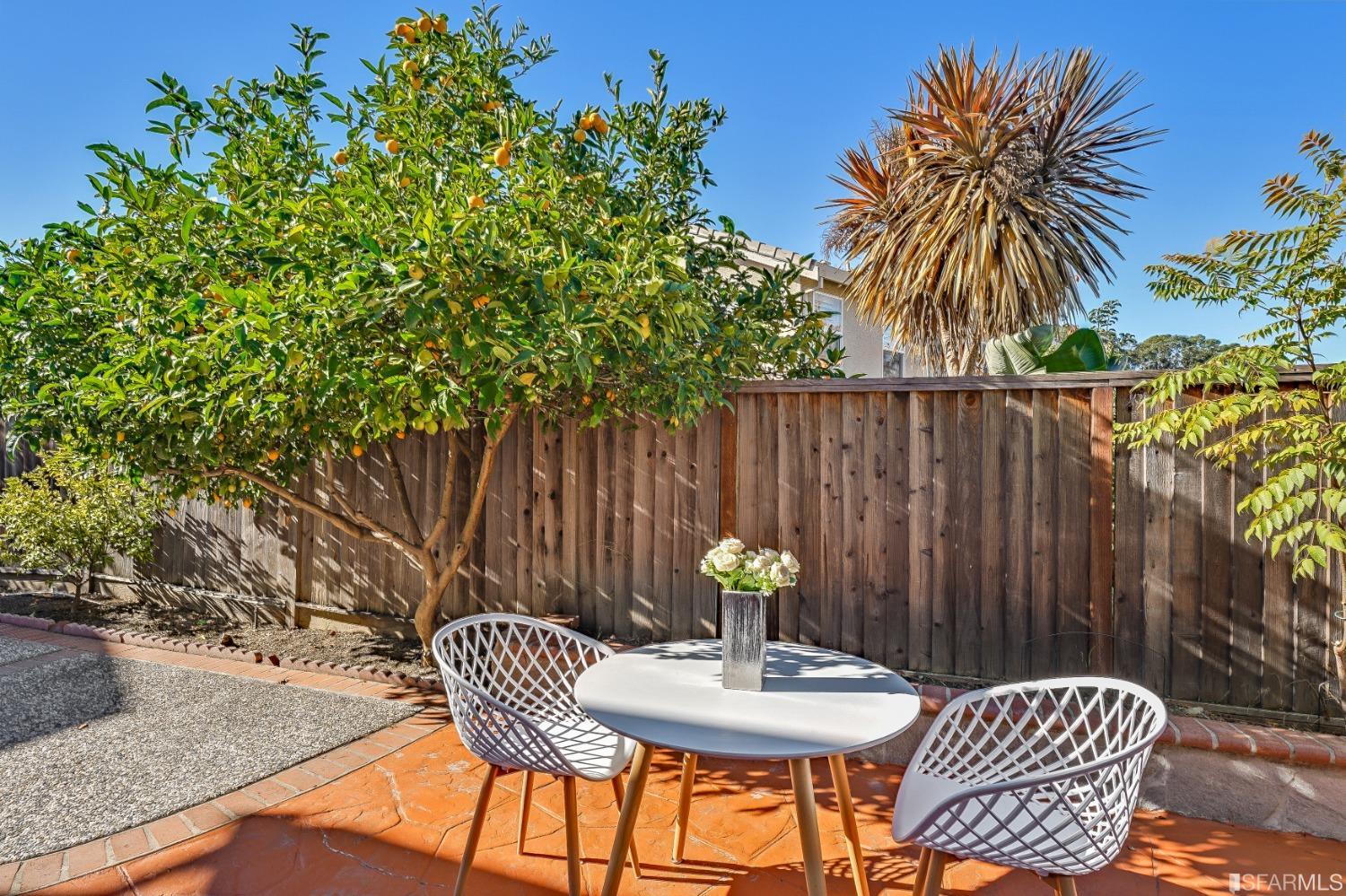 307 Hawk Ridge Drive Richmond, CA 94806 - Photo 22 of 24 a view of outdoor sitting area with a tree