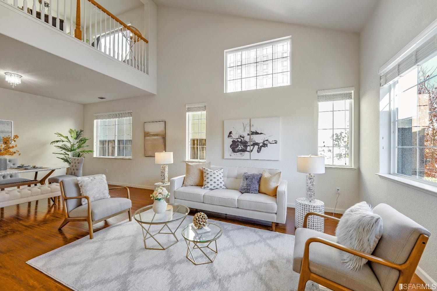 307 Hawk Ridge Drive Richmond, CA 94806 - Photo 4 of 24 a living room with furniture wooden floor and a large window