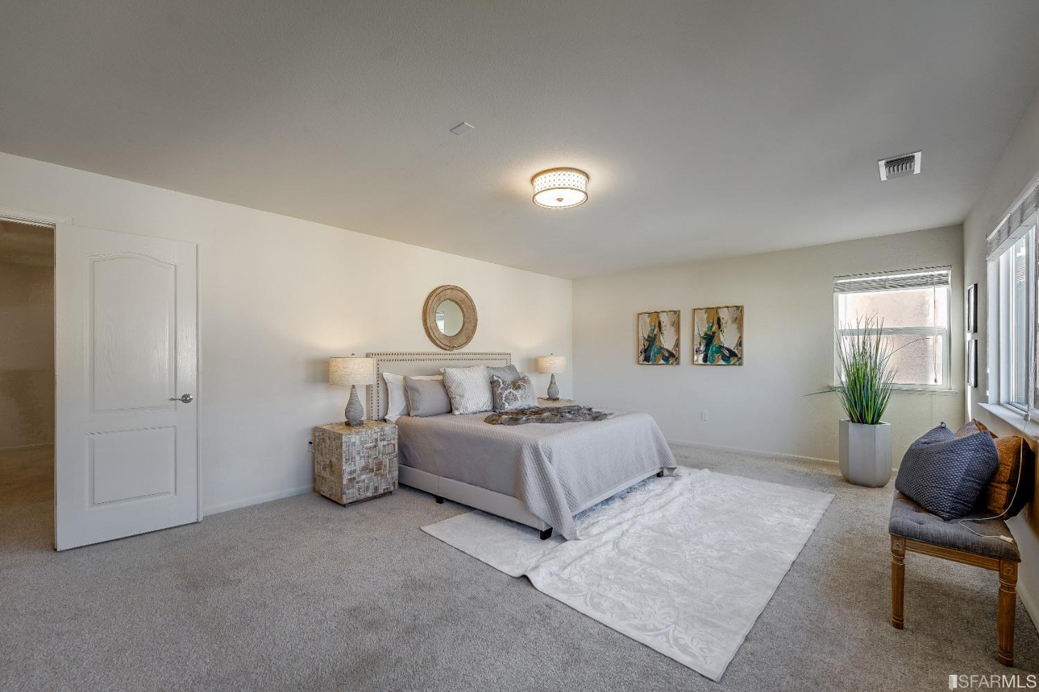 307 Hawk Ridge Drive Richmond, CA 94806 - Photo 10 of 24 a bedroom with bed and a window