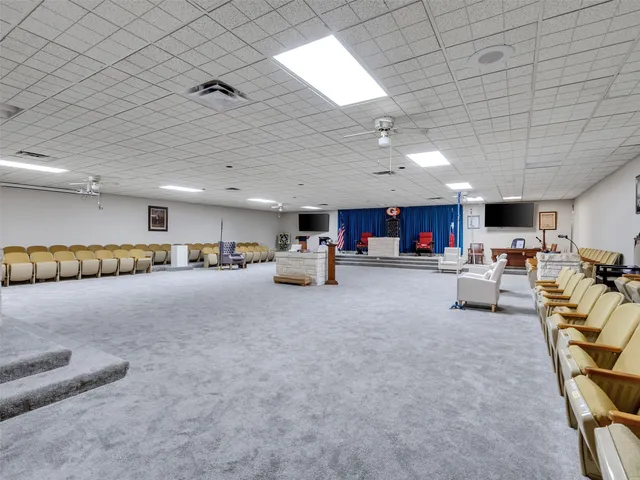 a living room with furniture and a couch