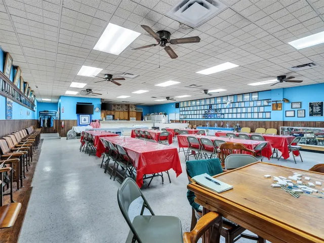 a room with lots of furniture and clutter