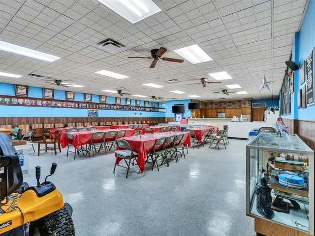 a room with lots of furniture and clutter