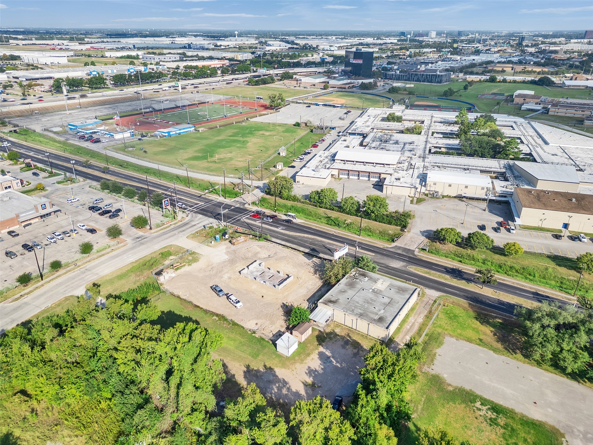 151 West Road Houston, TX 77037 - Photo 5 of 35 Back view of 151 West Road located across from the Aldine ISD stadium complex and minutes from Beltway 8 and Hardy Toll Road, the property benefits from both local and regional connectivity.