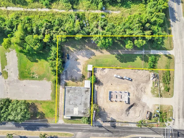 an aerial view of a house with a garden