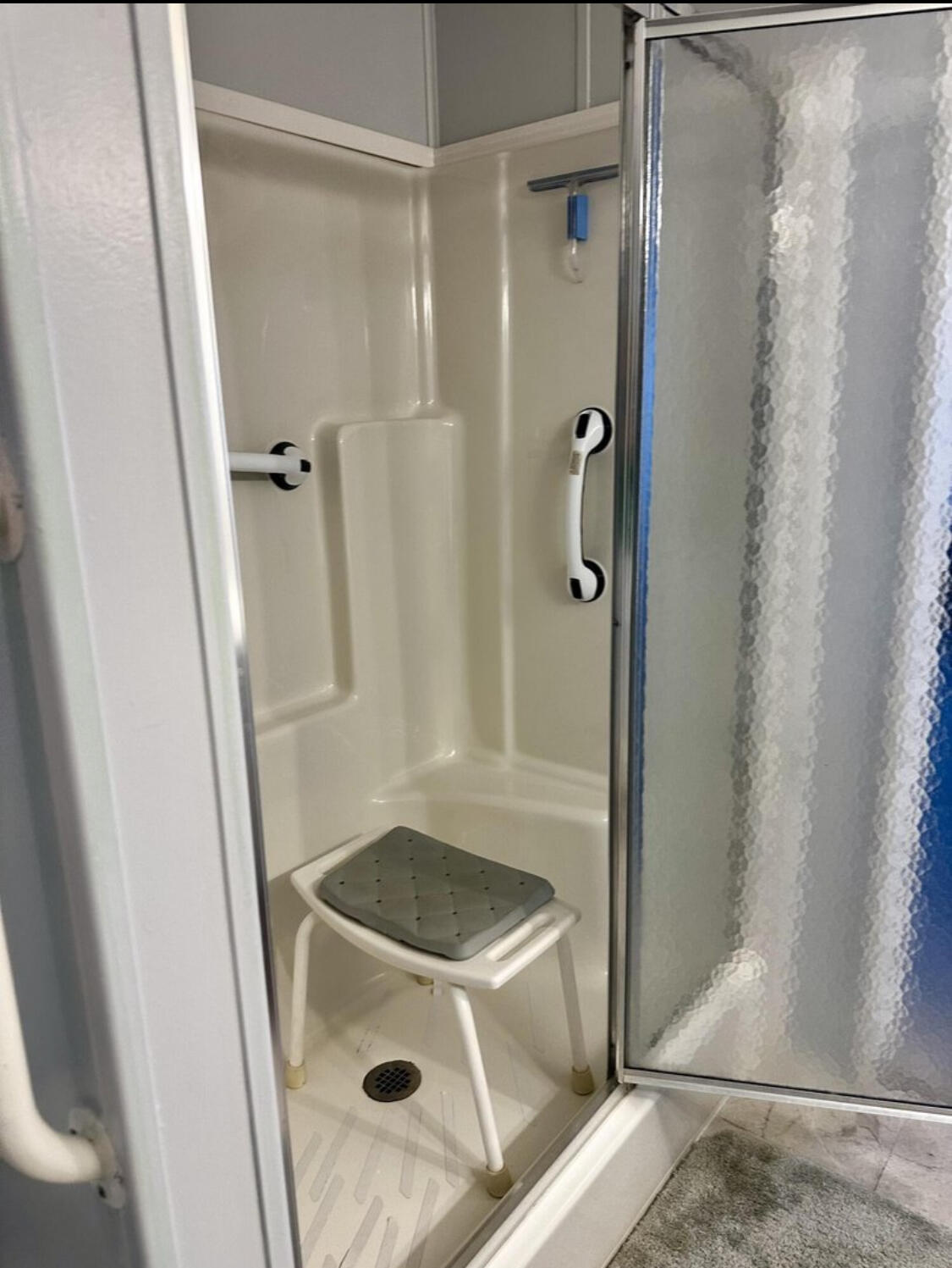 1510 Southwest 35th Circle Okeechobee, FL 34974 - Photo 31 of 53 a bathroom with a sink and glass door shower