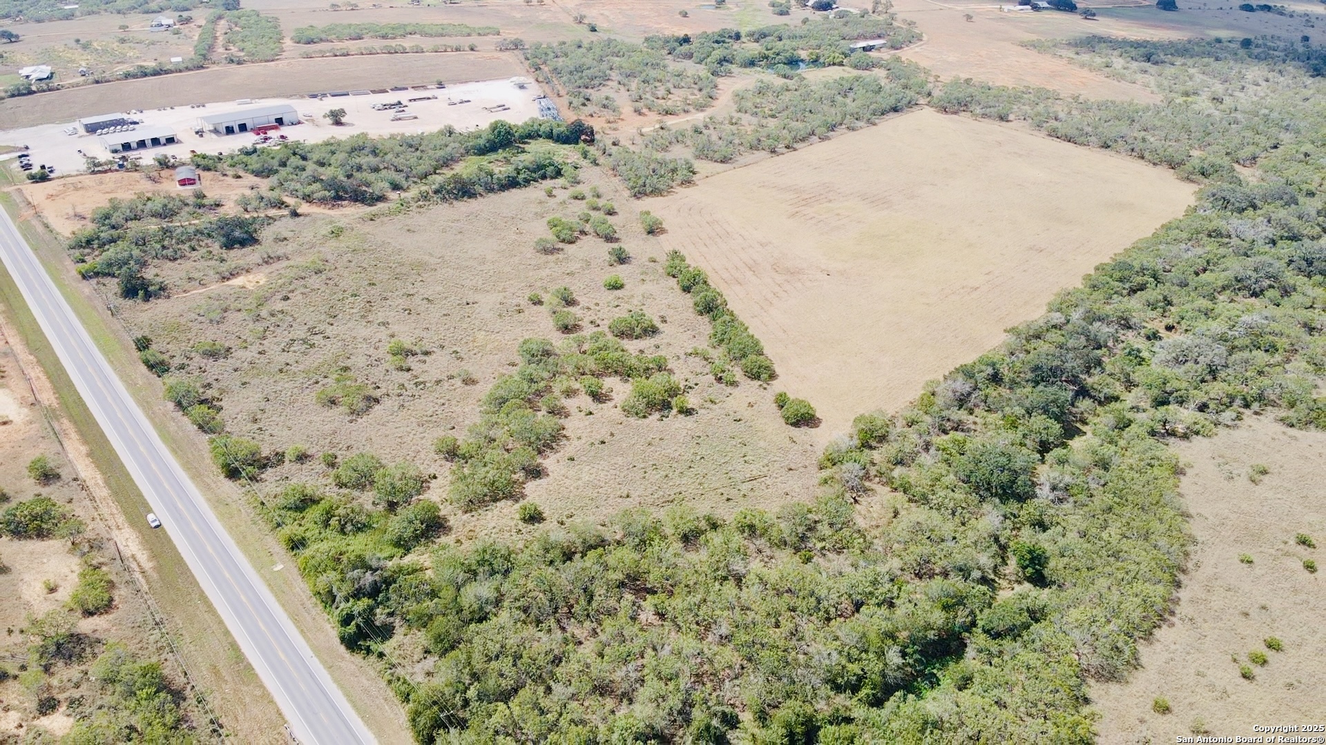 0 North State Highway 16 Jourdanton, TX 78026 - Photo 18 of 21 a view of a garden with a pathway