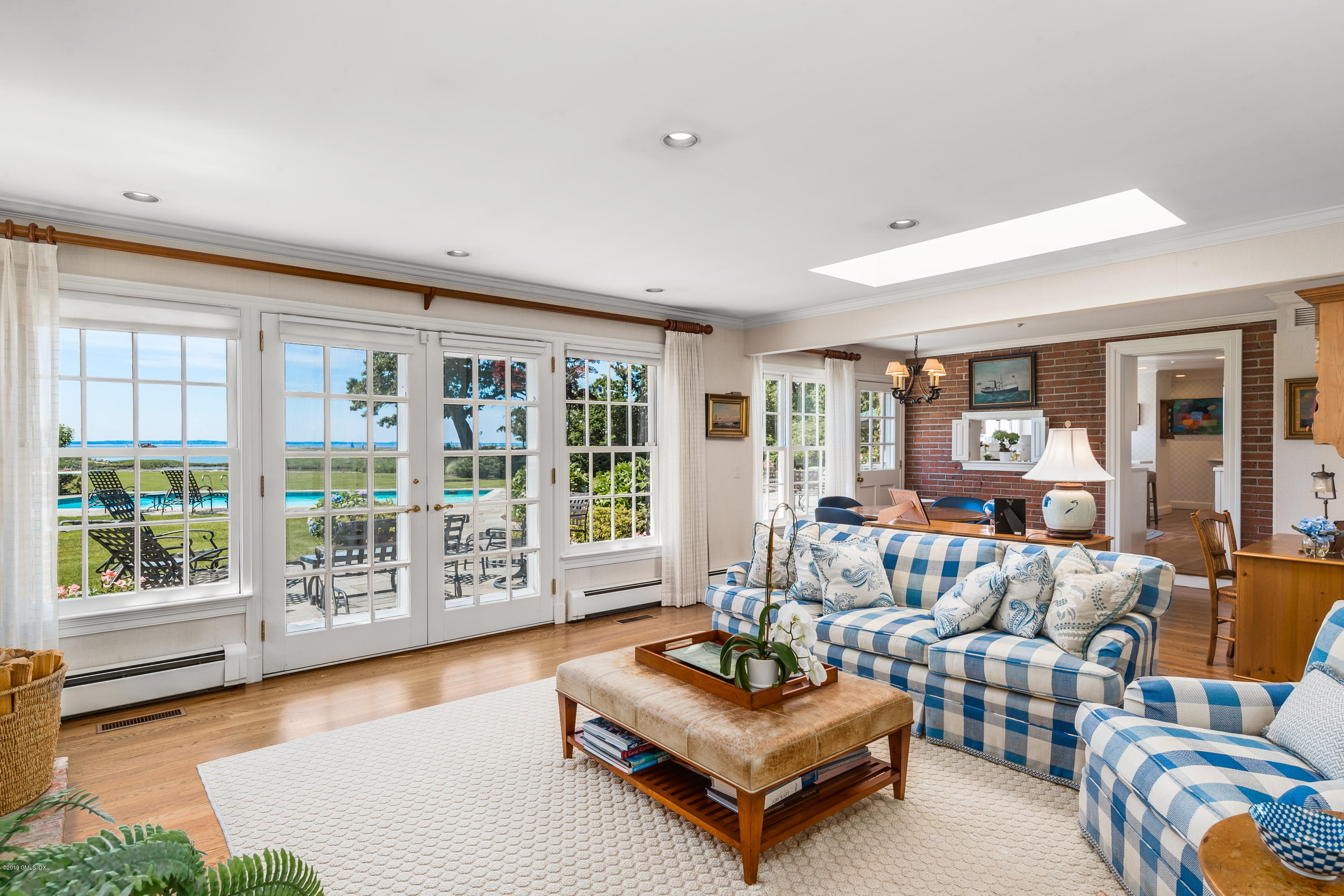 78-80 Cedar Cliff Road Riverside, CT 06878 - Photo 12 of 24 a living room with furniture and a large window