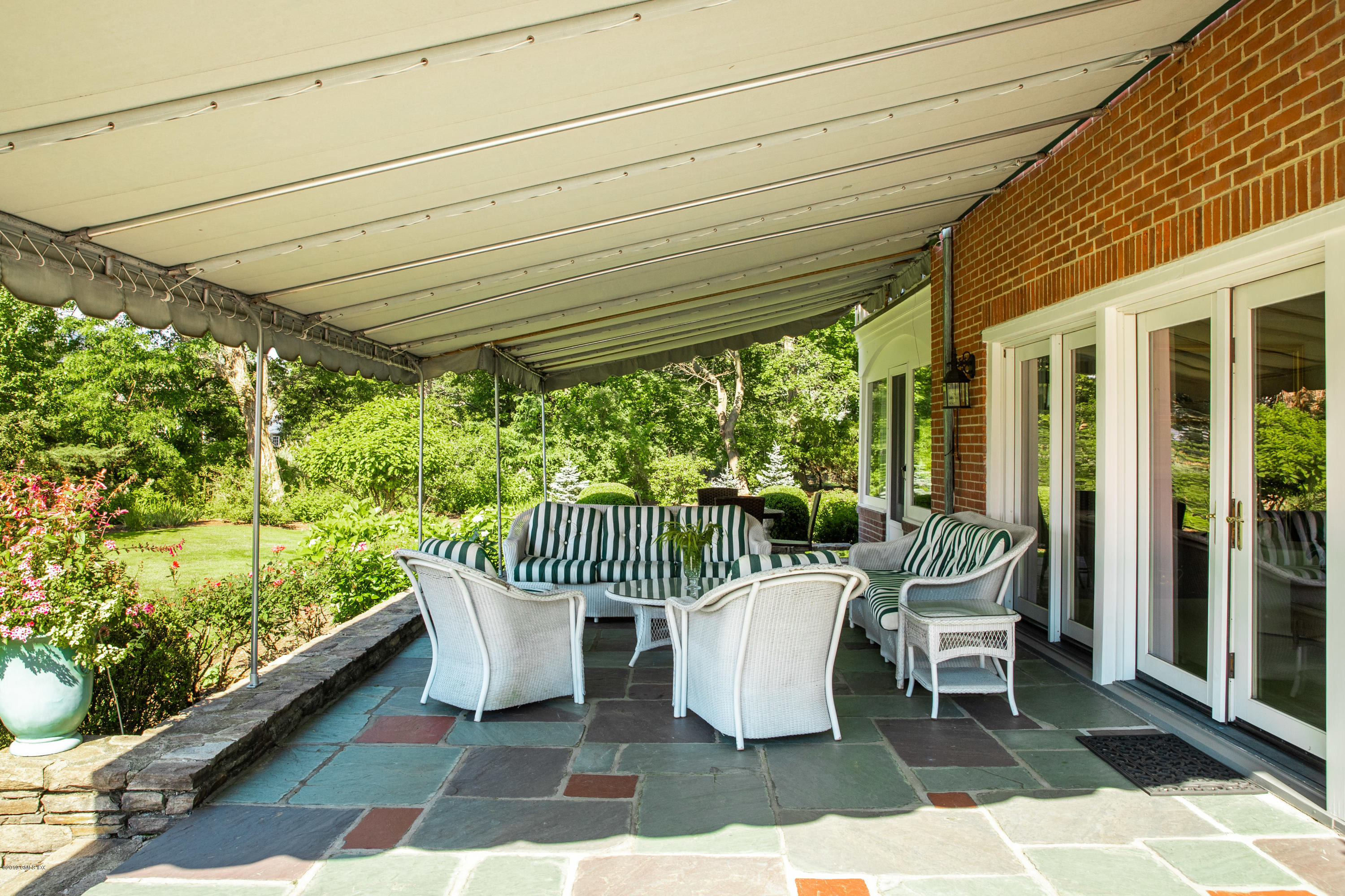 78-80 Cedar Cliff Road Riverside, CT 06878 - Photo 13 of 24 a view of a chairs and table in the balcony