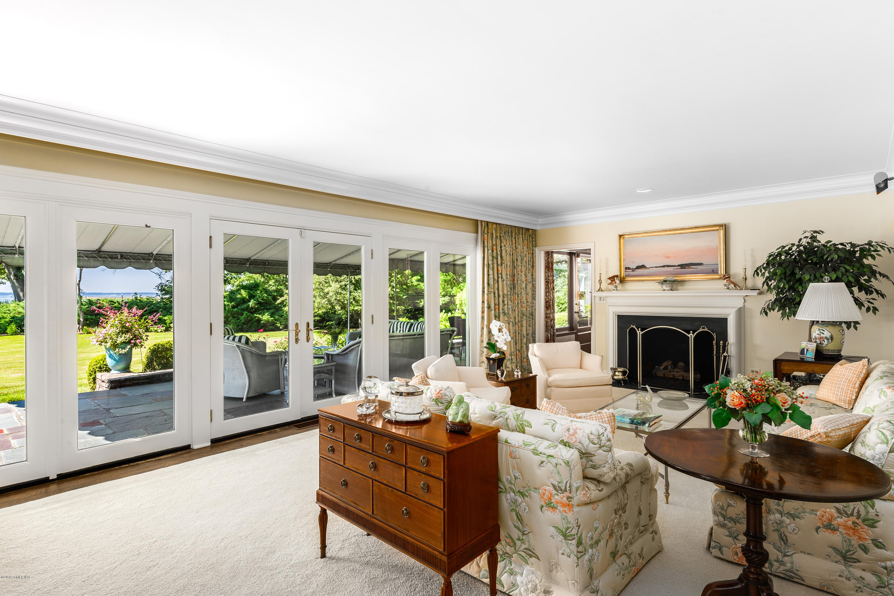 78-80 Cedar Cliff Road Riverside, CT 06878 - Photo 6 of 24 a living room with furniture and a fireplace