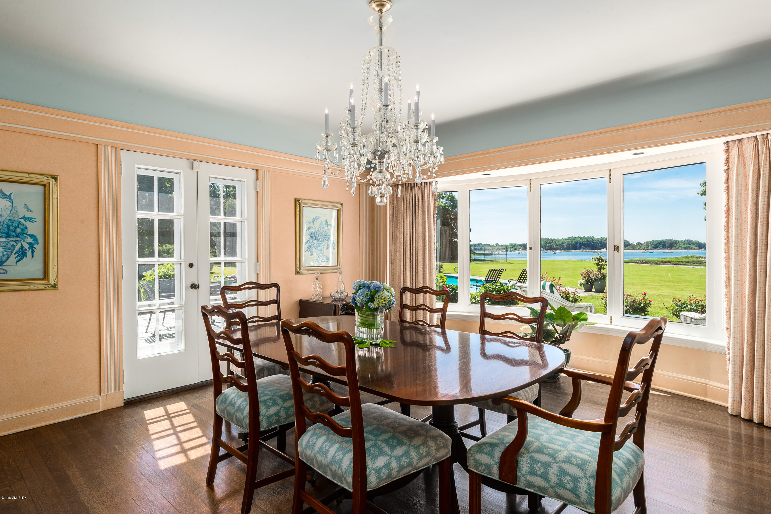 78-80 Cedar Cliff Road Riverside, CT 06878 - Photo 7 of 24 a view of a dining room with furniture window and wooden floor