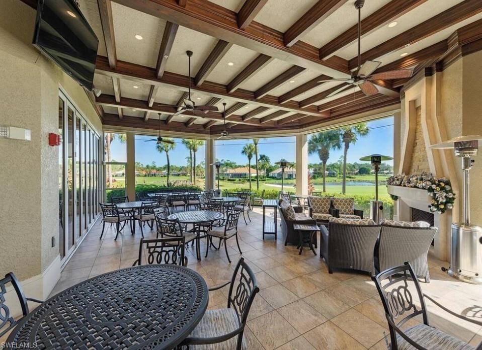 8488 Radcliffe Terrace, Unit 104 Naples, FL 34120 - Photo 49 of 50 a view of a dining room with furniture window and outside view