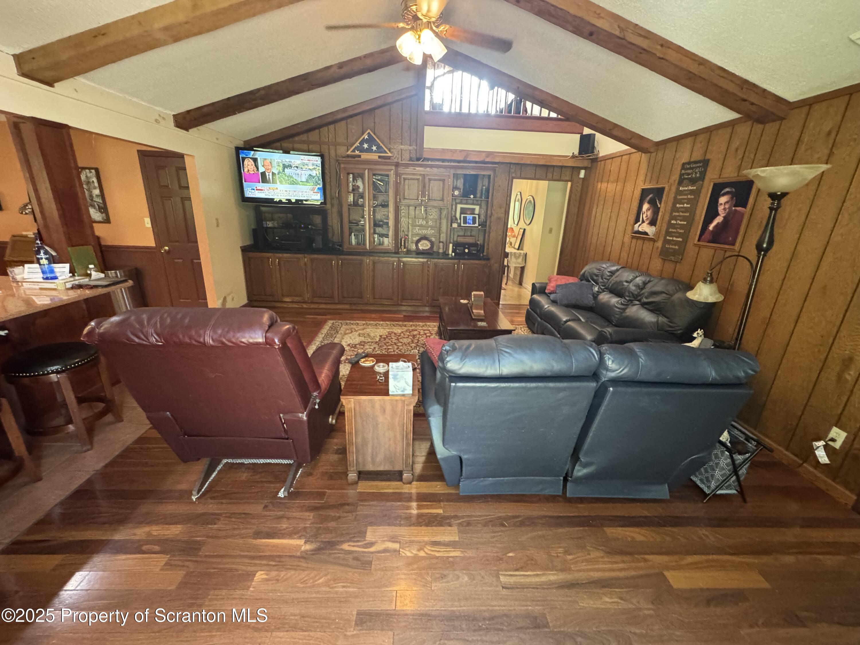180 Savage Road Nicholson, PA 18446 - Photo 13 of 39 a living room with furniture and a window