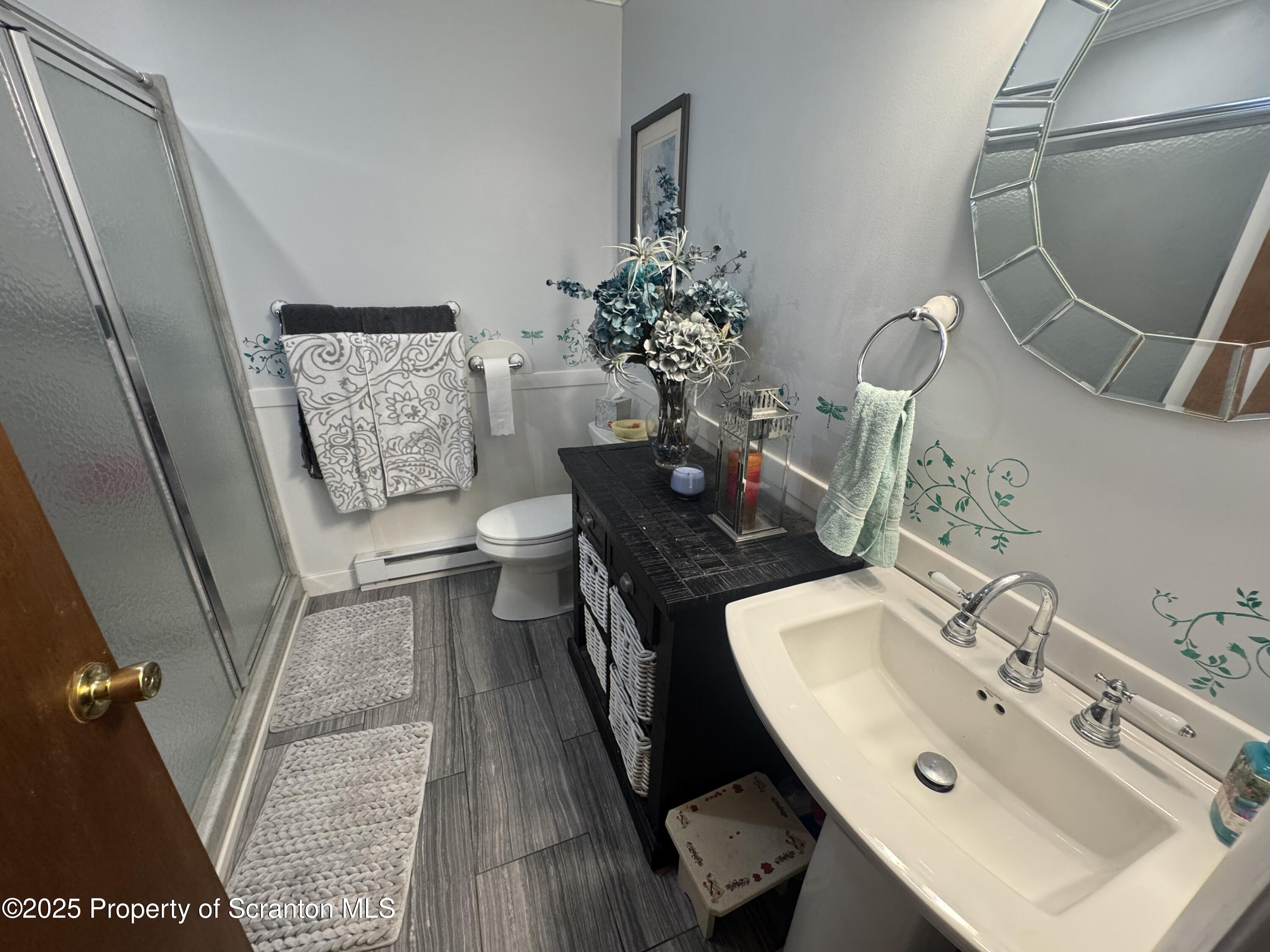 180 Savage Road Nicholson, PA 18446 - Photo 14 of 39 a bathroom with a sink mirror and toilet