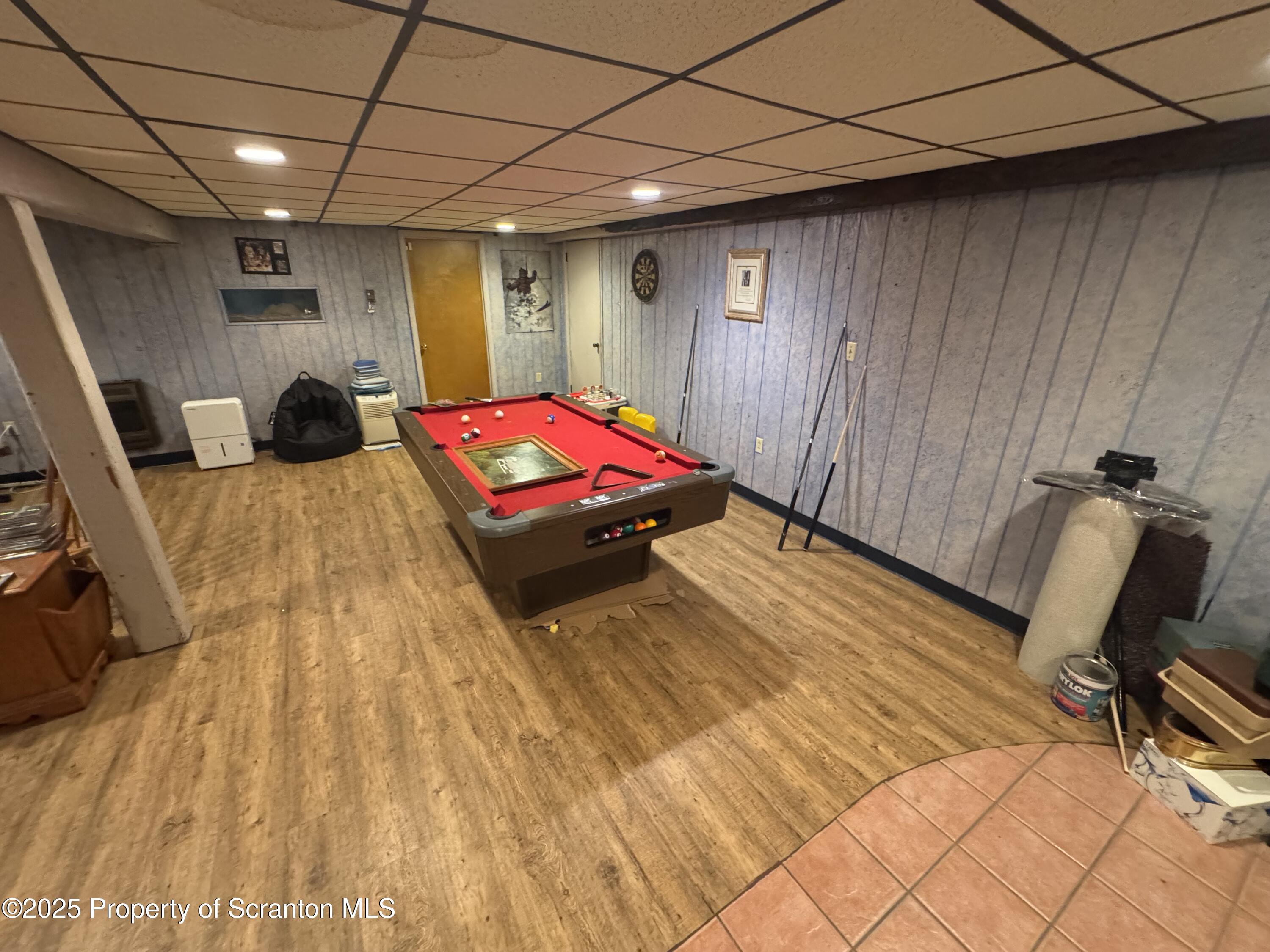 180 Savage Road Nicholson, PA 18446 - Photo 25 of 39 a bedroom with a bed a desk and chair