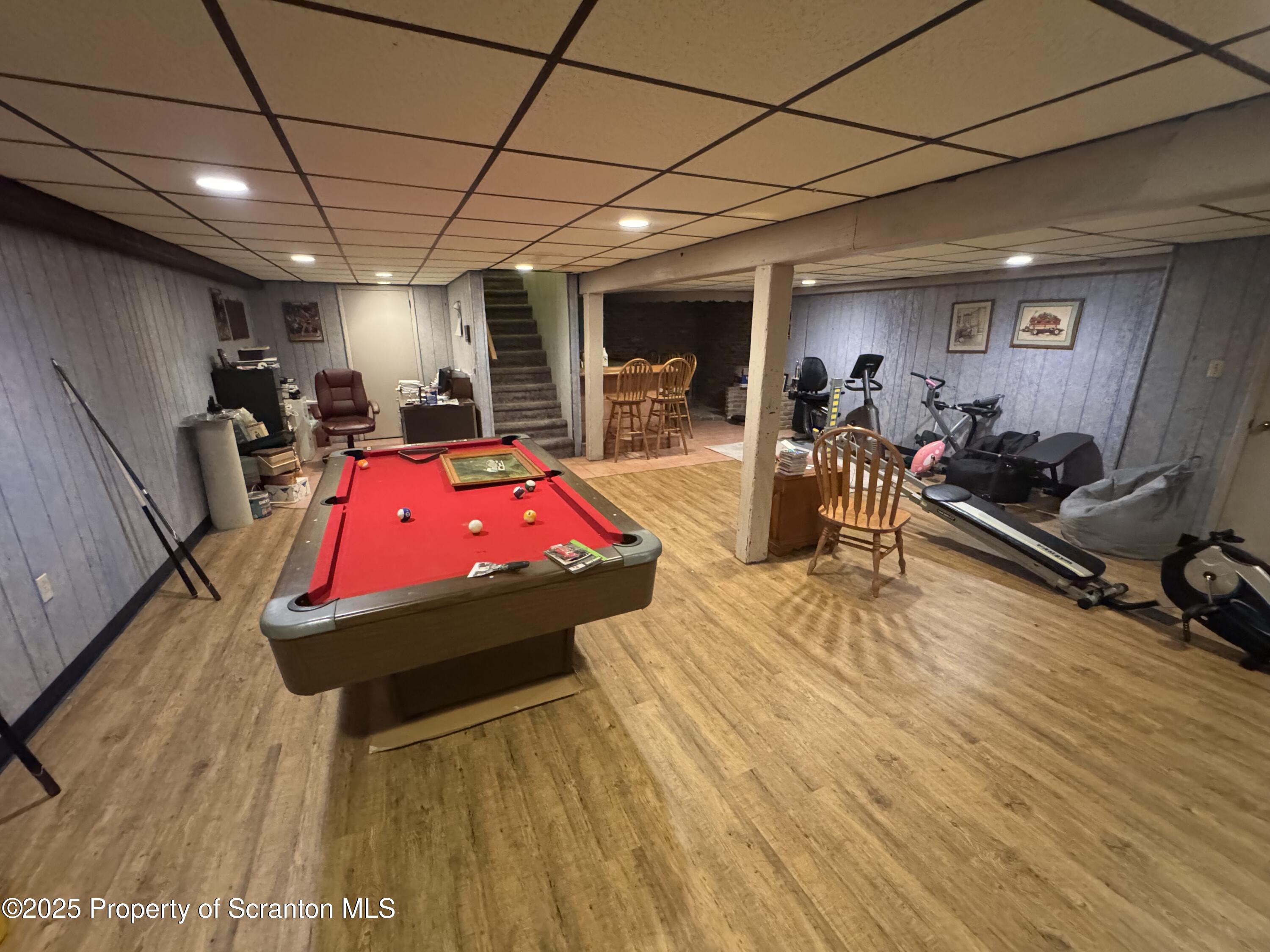 180 Savage Road Nicholson, PA 18446 - Photo 28 of 39 a room with gym equipment and a table