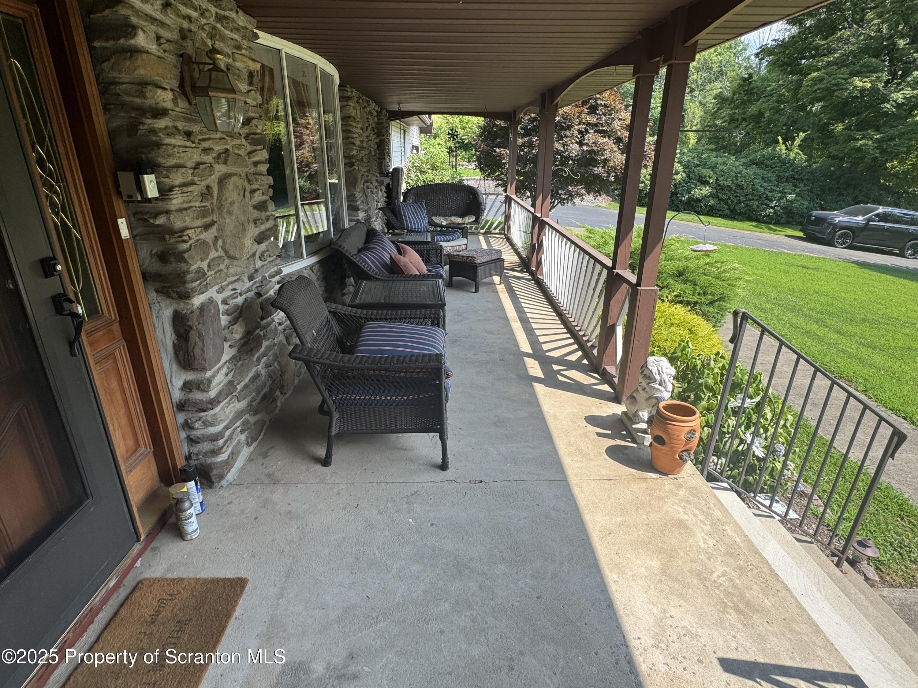 180 Savage Road Nicholson, PA 18446 - Photo 3 of 39 a view of swimming pool with a patio