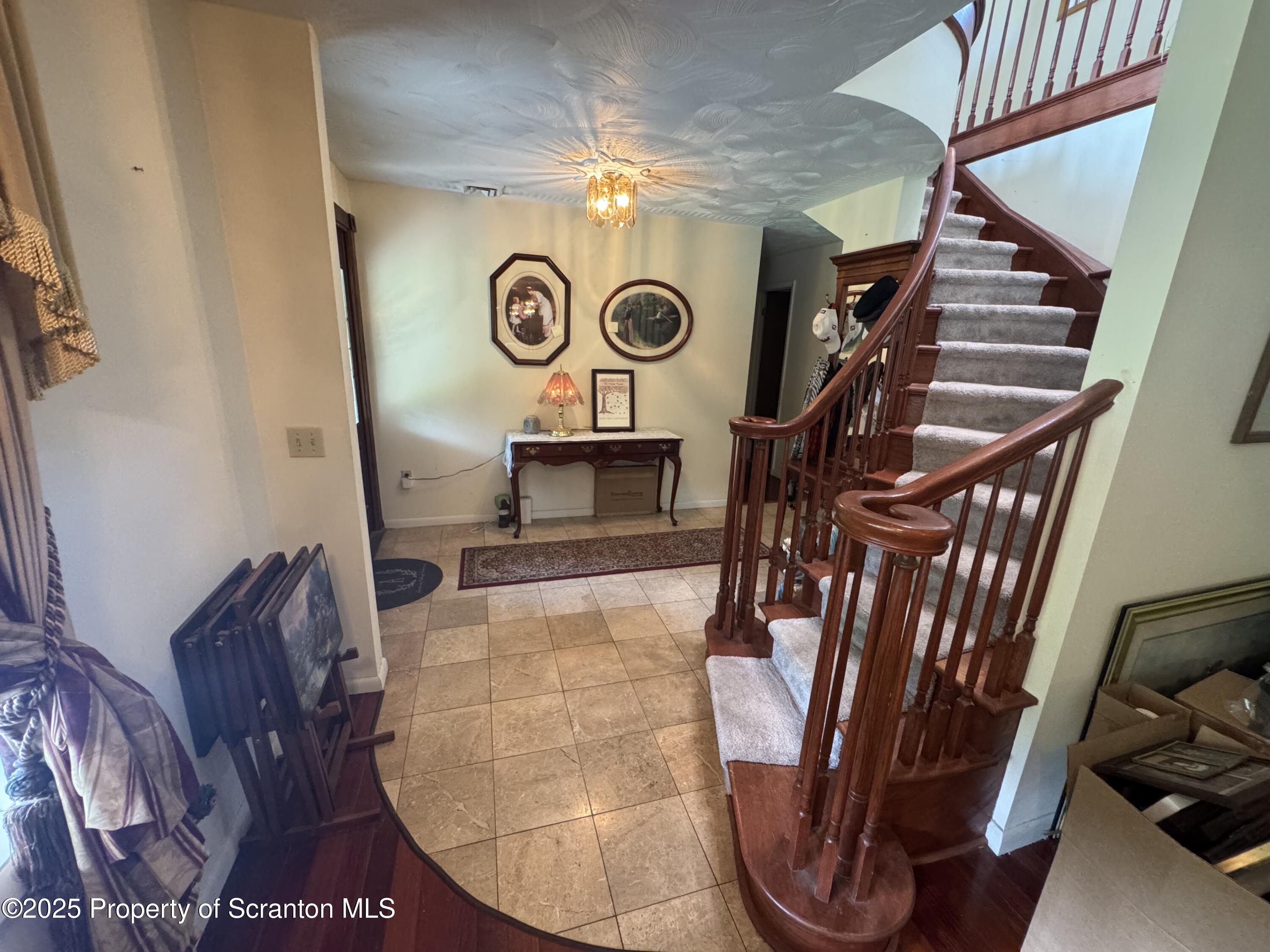 180 Savage Road Nicholson, PA 18446 - Photo 6 of 39 a view of entryway with a and hallway