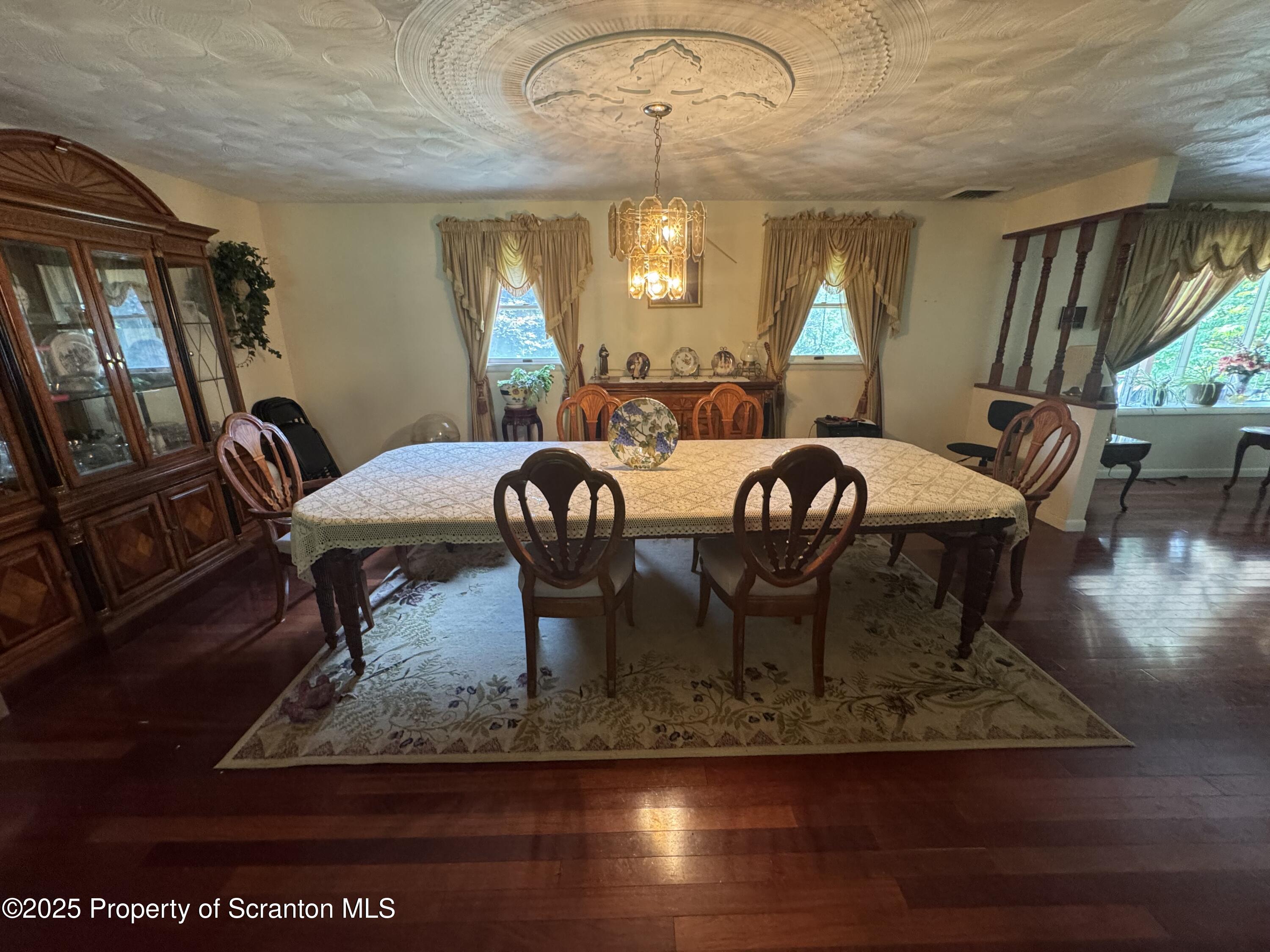 180 Savage Road Nicholson, PA 18446 - Photo 8 of 39 a view of a dining room with furniture window and wooden floor