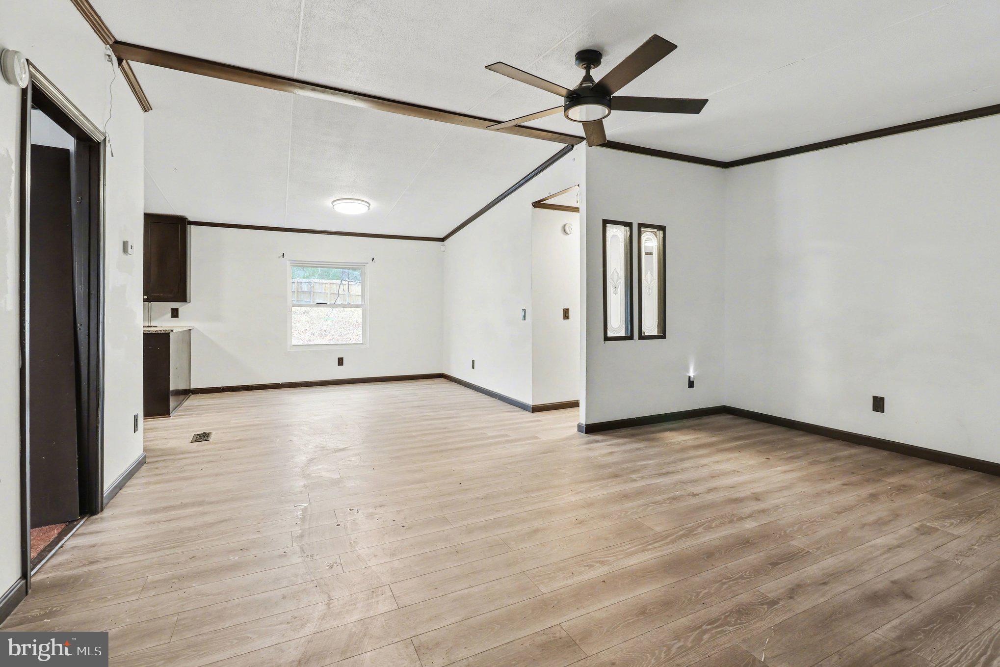 4901 Partlow Road Partlow, VA 22534 - Photo 13 of 48 living room looking into dining room