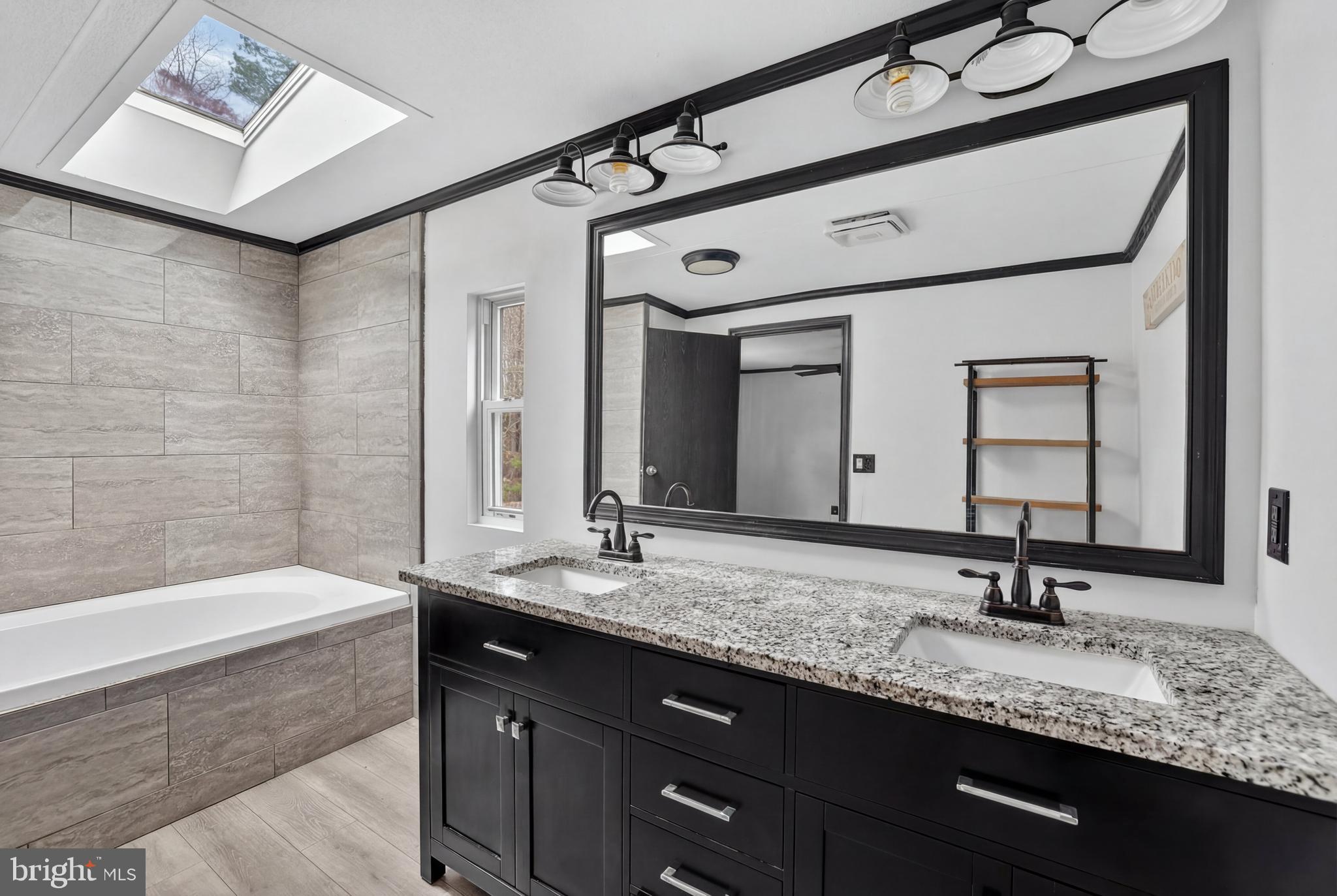 4901 Partlow Road Partlow, VA 22534 - Photo 15 of 47 beautiful en-suite bathroom with sky-light