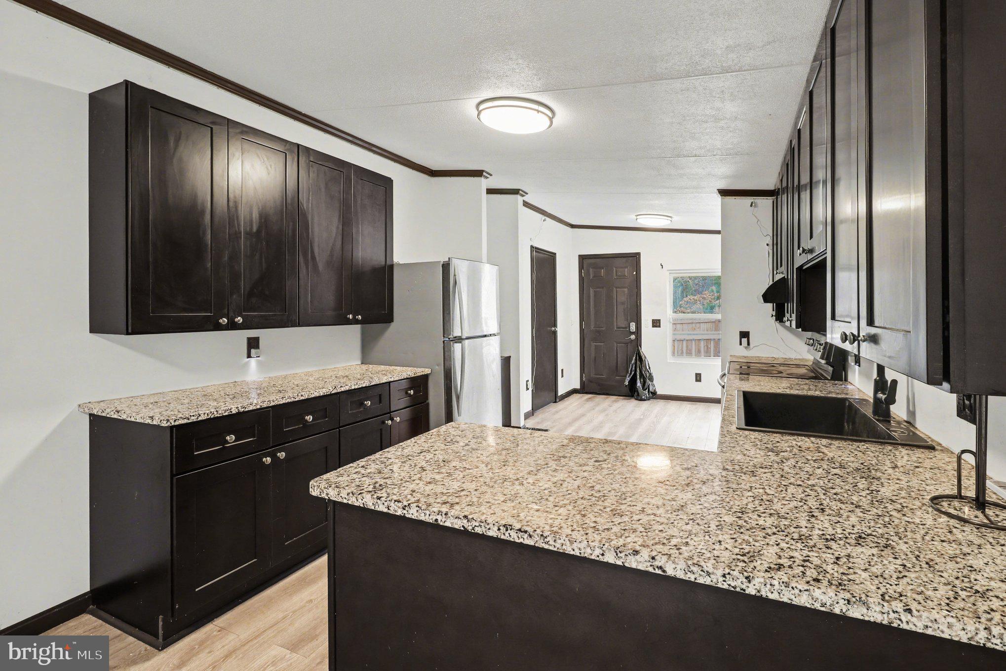 4901 Partlow Road Partlow, VA 22534 - Photo 23 of 47 showing breakfast area, side entrance and laundry