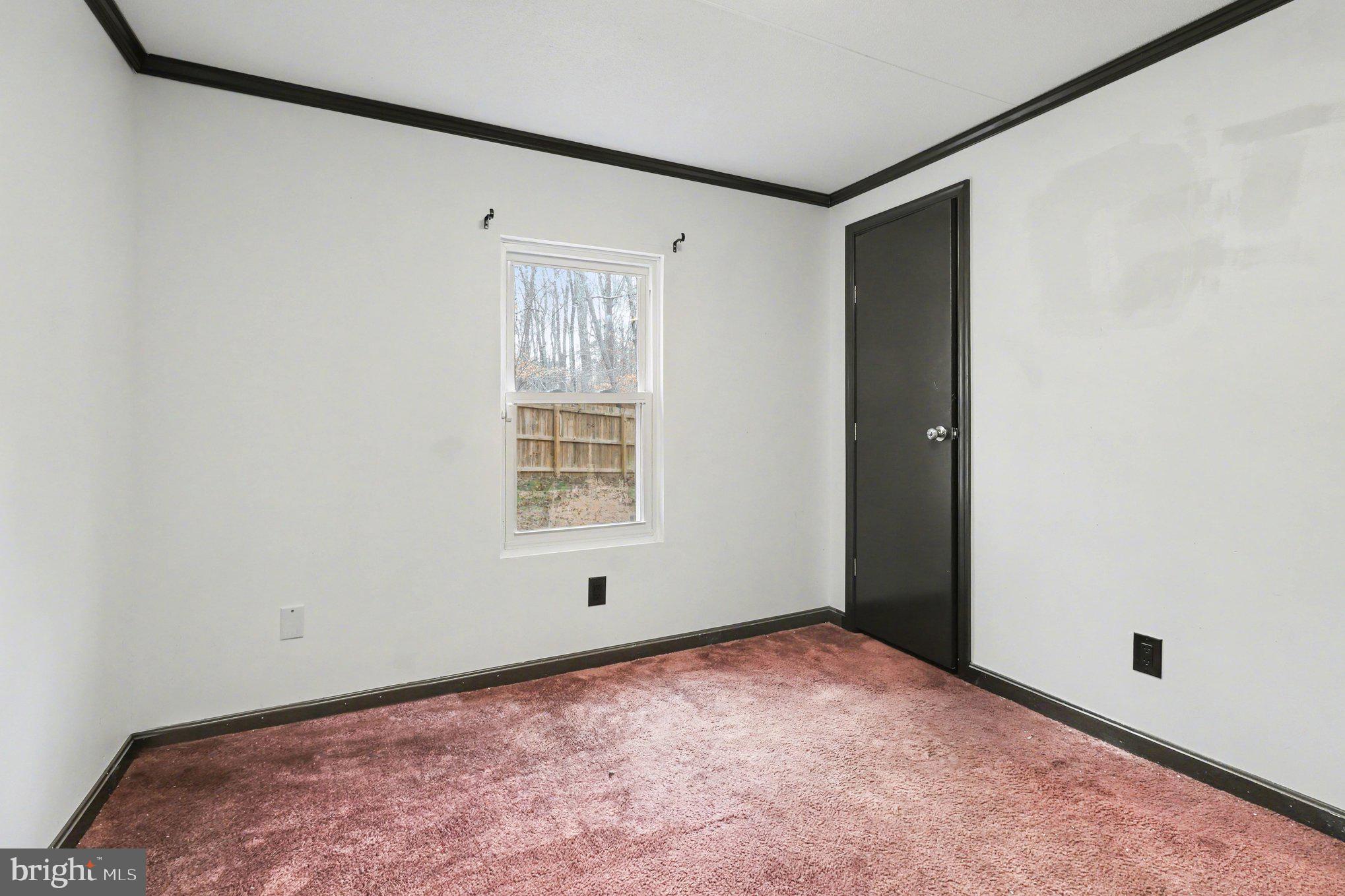 4901 Partlow Road Partlow, VA 22534 - Photo 28 of 48 2nd bedroom showing closet door
