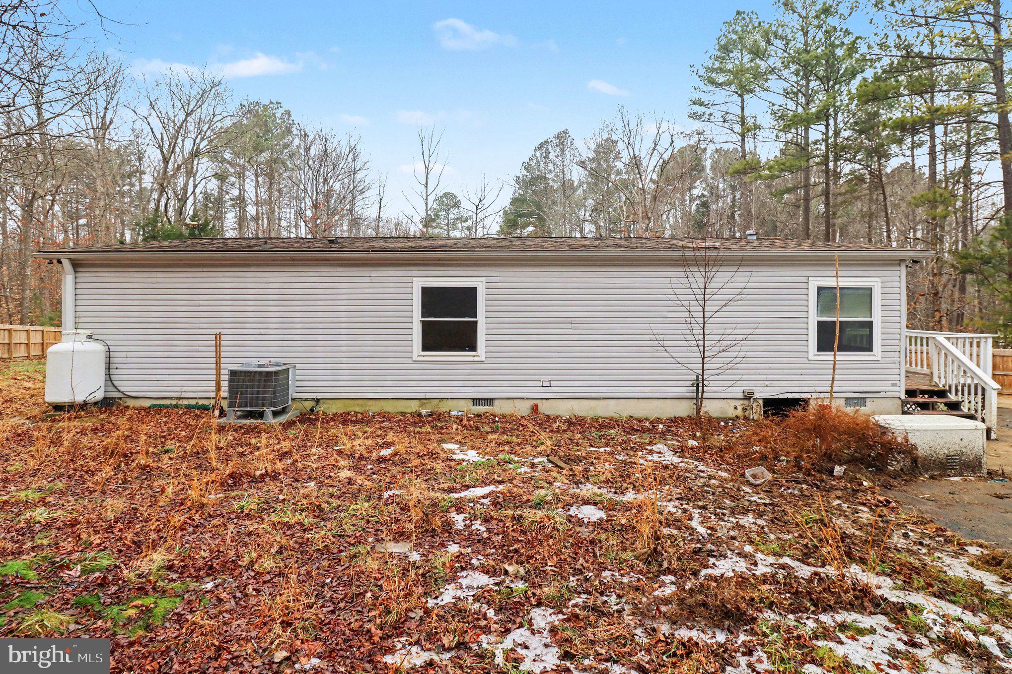 4901 Partlow Road Partlow, VA 22534 - Photo 36 of 48 back of house showing kitchen window