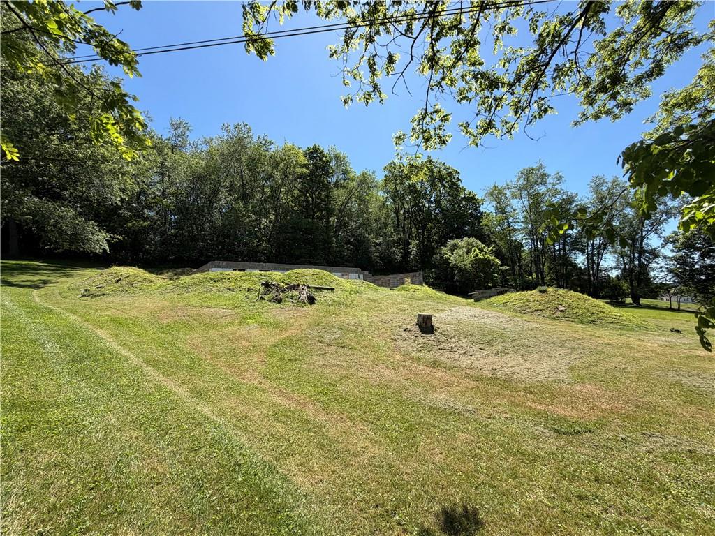 250 Hazel Kirk Road Monongahela, PA 15063 - Photo 3 of 5 a swimming pool with an outdoor space and seating area