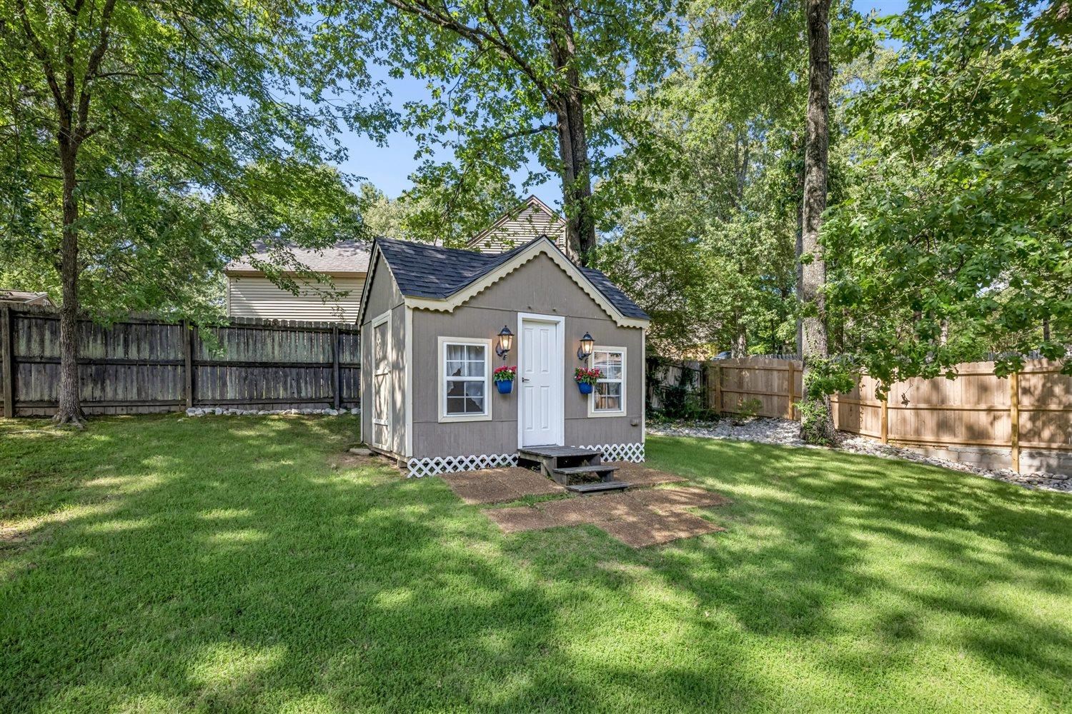 8970 Farmoor Road Germantown, TN 38139 - Photo 32 of 35 Outdoor structure, real windows and screens, shelving, lots of space for imagination playing