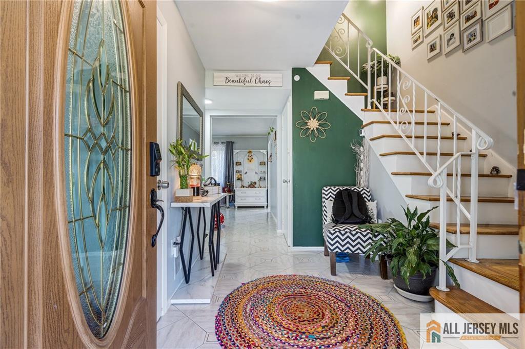 62 Laura Avenue Edison, NJ 08820 - Photo 14 of 35 a view of living room and bathroom