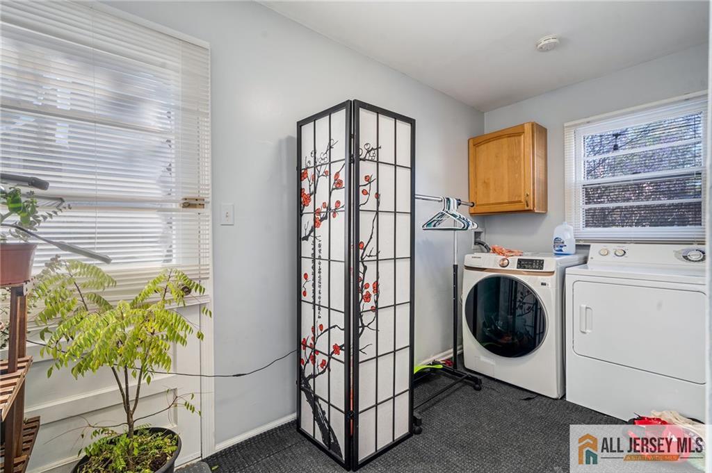 62 Laura Avenue Edison, NJ 08820 - Photo 24 of 35 a view of a hallway with washer and dryer