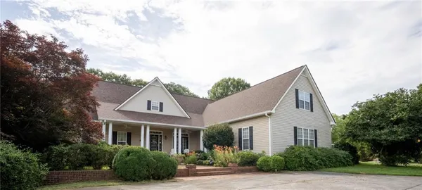 a view of a trees with a yard