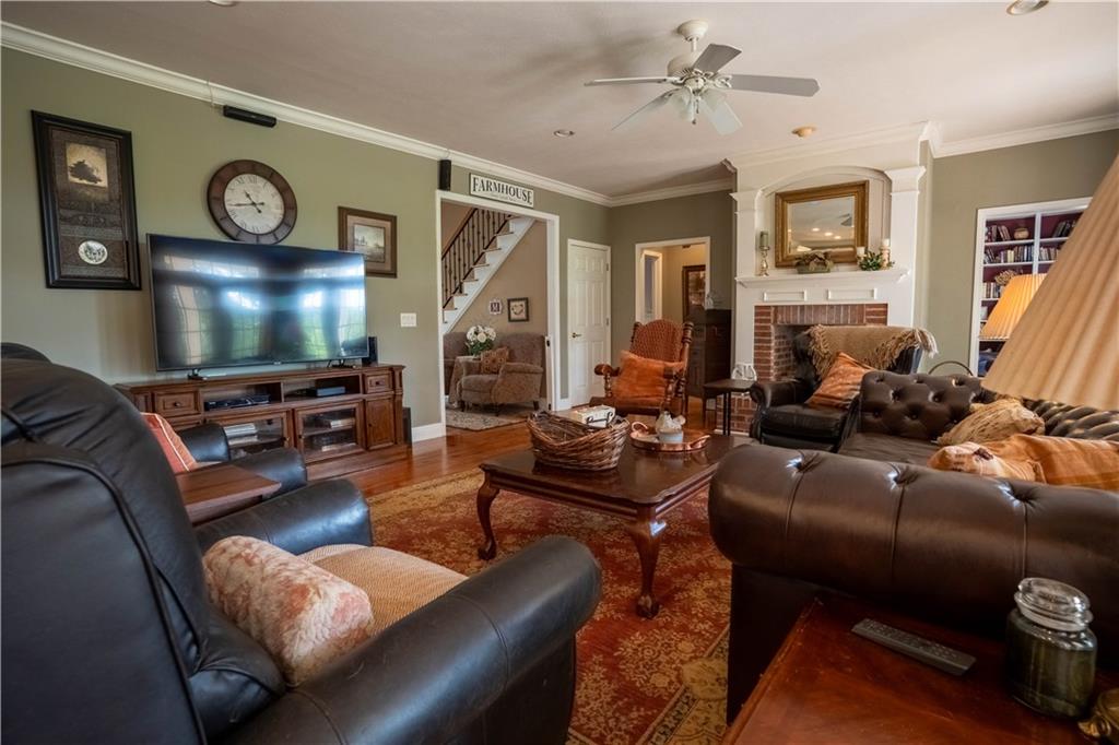 442 Buffalo Creek Road Carrollton, GA 30117 - Photo 14 of 39 a living room with furniture and a flat screen tv